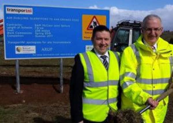 Robin Swann MLA joins party colleague and Roads Minister Danny Kennedy MLA at the official ground-breaking ceremony for the commencement of the continued dualling of the A26.