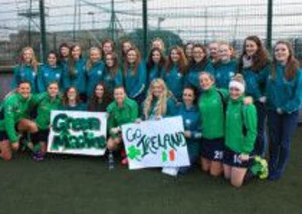 Ireland Ladies Hockey team captain Megan Frazer (centre), pictured with the Foyle College Hockey team, who supported Ireland at the recent UDG Healthcare World League Round 2 competition.