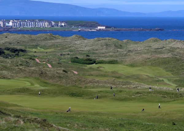 A general view of The Royal Portrush Course, Portrush. PRESS ASSOCIATION Photo. Picture date: Monday June 16, 2014. The Royal Portrush course in Northern Ireland has been invited to join the rota to host future Open Championships. The famous seaside links on the Causeway coast last staged the Open in 1951 - the only time it has been played outside England and Scotland. The major could return to Portrush as early as 2019. See PA Story GOLF Portrush. Photo credit should read: Niall Carson/PA Wire.