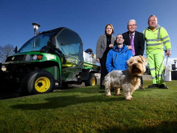 Promoting Lisburn & Castlereagh City Council's Dog Fouling Campaign throughout April alongside the FIDO street cleaner are: (l-r) Councillor Jenny Palmer, Chair of Lisburn City Council's Environmental Services Committee; Lisburn City Council Dog Warden Craig Maxwell; Councillor Brian Hanvey, Chairman of Lisburn & Castlereagh City Council's Environmental Services Committee; Mark Kerr from Castlereagh Borough Council and Gizmo the dog.