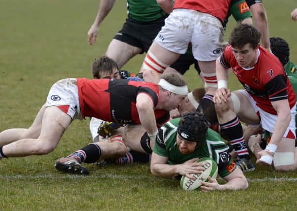 David Ferguson dives over to score a try for City of Derry during Saturday's match against UCC. INLS1315-119KM