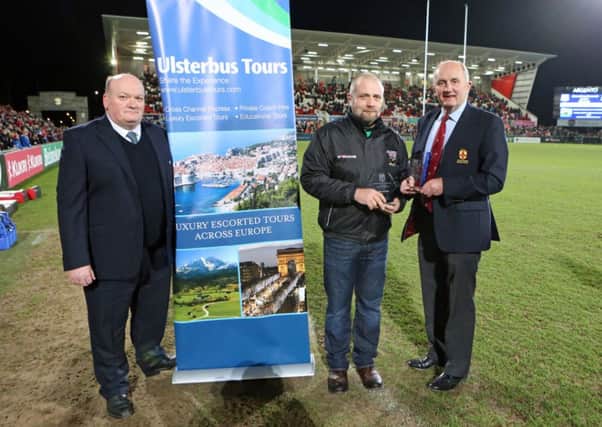 City of Derrys Rodney Balfour (centre) is pictured with David McGaughey of Ulsterbus Tours (left) and Ulster Rugby President, John Kinnear, receiving the Ulster Rugby Coach of the Year award at the Ulster versus Cardiff game at Kingspan Stadium on Friday night. Picture by John Dickson/DicksonDigital