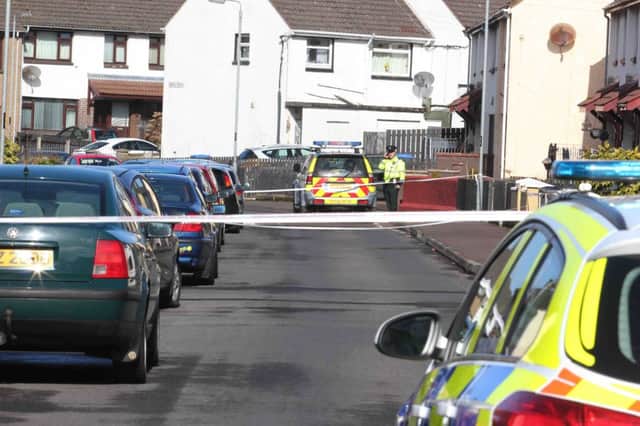 Police in Coleraine at the scene at Maple Drive after a man in his 20's was shot. Police in Coleraine are appealing for information. PICTURE MARK JAMIESON.