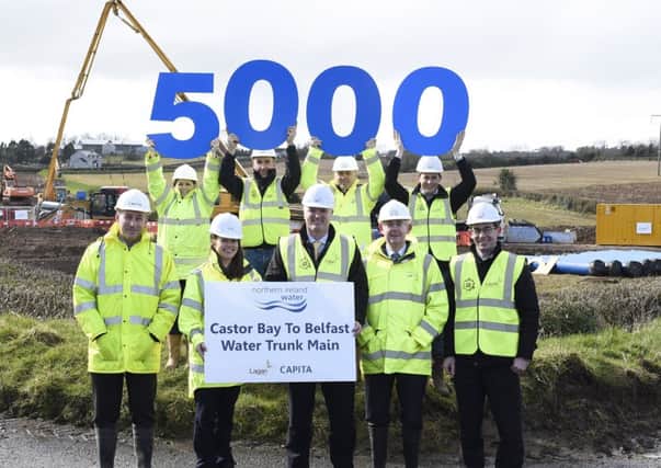 The project team mark the 5000 pipes milestone on site at the Moyrusk Road, Moira.
