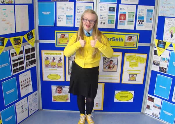 Caoimhe gives the thumbs up for Seth at St Colm's Draperstown