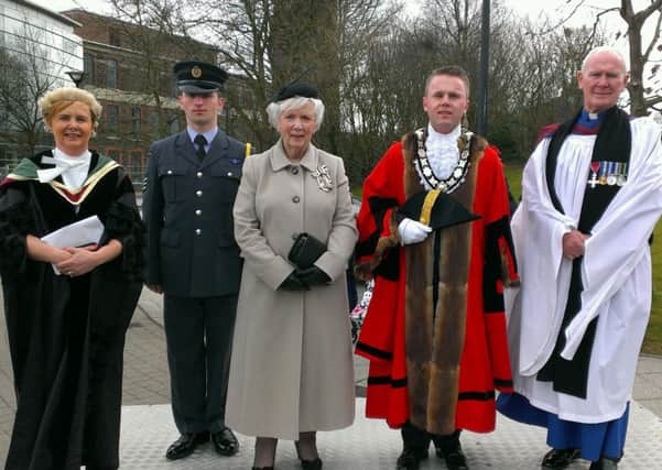 Council chief executive Jacqui Dixon; RAF Cadet Joshua Catherall; HM Lord Lieutenant for Co Antrim, Mrs Joan Christie OBE; Mayor Thomas Hogg and Rev Campbell Dixon MBE took the salute as the parade passed through the grounds of Mossley Mill. INNT 14-504CON
