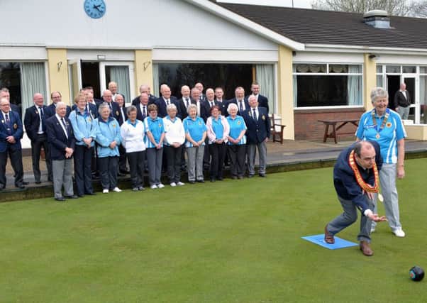 The first bowl of the new season at Ballymena Bowling Club was delivered by Club President George watched by the Lady President and club members. INBT 14-959H