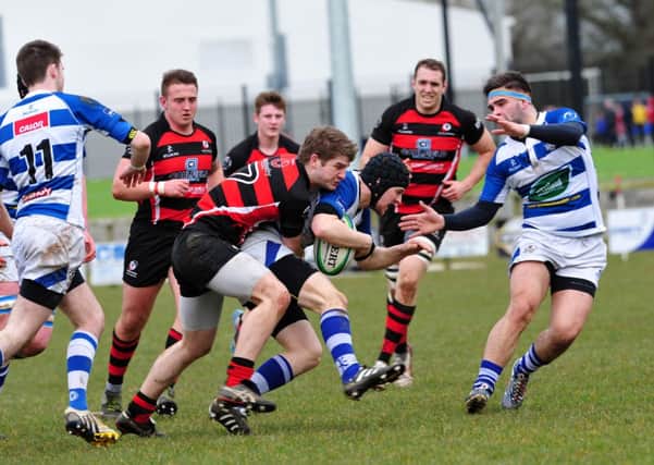 Rainey break up a Dungannon attack during Saturday's AIL clash at Hatrick Park.INMM1315-369