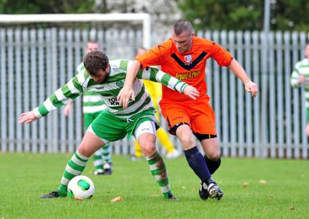 Cookstown Celtic's Stephen Devlin in action