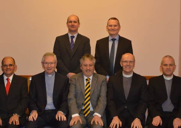 Commission of Presbytery ictured at the installation of Rev Philip McCullough in Third Presbyterian Church, Portglenone, on Friday evening  were (Front row from left:  J Lamont (Deputy Clerk), Rev D Knowles (Convener), Rev Philip McCullough (new minister), Rev Dr D Murphy (Acting Moderator), Rev D McGaughey, (Back row from left) Derek Patterson, and Robin Dickey (Clerk of Session).