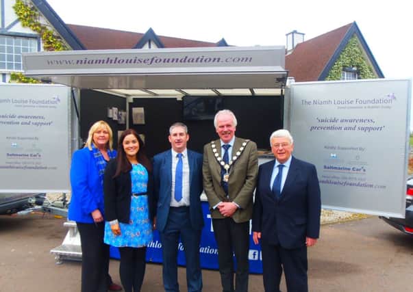 Mayor Roger Burton with representatives of the Niamh Louise Foundation at the launch of the new mobile therapy unit