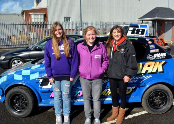 Chelsea and Shannon Morrow with Lauren Reid at the Ultimate Car Show in Larne. INLT 13-037-GR