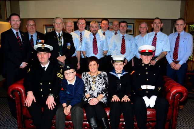 Members of the Red Hand and Thistle RSC in the mayor's parlour to hand over cheques to the cadets representatives and the Royal British Legion, included is former Mayoress of Carrickfergus, Patricia Johnstone. INCT 13-048-GR