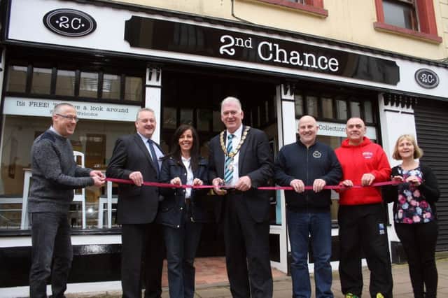 The Mayor of Ballymoney, Alderman Bill Kennedy, officially cuts the tape on Ballymoney's latest charity shop, 2nd Chance, which sells recycled and repaired furniture.Included is project manager Jason Lodge as well as Trustees and volunteers