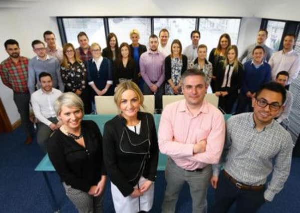 Staff of LCC Power at their headquarters in Cookstown. The company has gone from 7 to 55 staff in just over two years