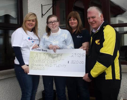 Sixteen-year-old Sophie, who is a lower sixth form student at Cross and Passion College in Ballycastle, was delighted to receive the cheque from the McMichael family. Also included is Bill Kennedy, Clerk of the Course for the Armoy Road Races.. Accompanied by her mum, Pauline and sister, Zoe, Sophie thanked the MINBM 15-15 AR