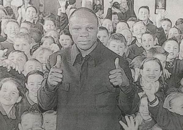 Boxing legend Chris Eubank dropped in on the pupils at Holy Family Primary School, Magherafelt, back in 2005.