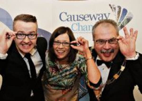 David Meade with the Causeway Chambers Annette Deighan and Ian Donaghey MBE.