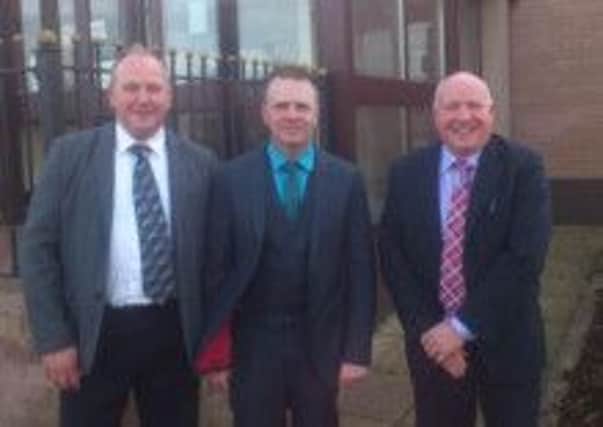 TUV candidate for Mid Ulster, Gareth Ferguson, centre, with party colleagues Noel Stewart, left, and Walter Millar