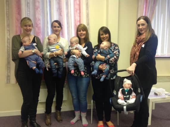 Christine and Joshua, Rachel and Sam, Emma and Erin, Colleen and Harry and Geraldine and Caitlin took part in the latest baby massage course at Carrickfergus Baptist Church. INCT 13-793-CON