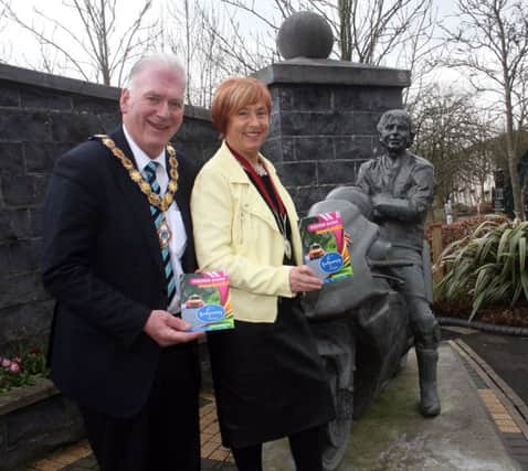 The Mayor of Ballymoney, Alderman Bill Kennedy, and the President of the Chamber of Commerce, Mrs Winnie Mellett, with the new Visitor Guide for Ballymoney which has just been launched.INBM15 15