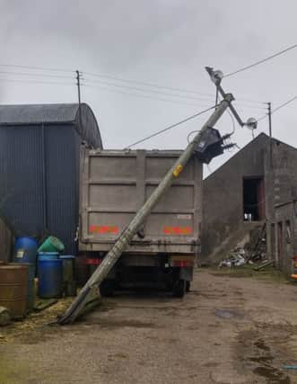 A lorry driver escaped injury after reversing into and breaking a high voltage electricity pole on a farm near Toome. Submitted picture.