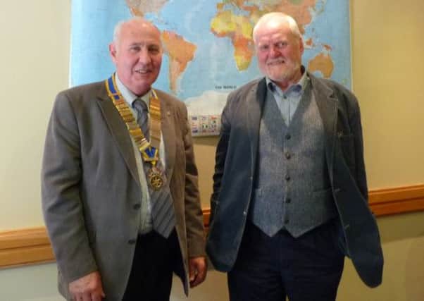 Sam Crowe, president of Carrickfergus Rotary Club, with guest speaker Bob Harper. INCT 14-704-CON