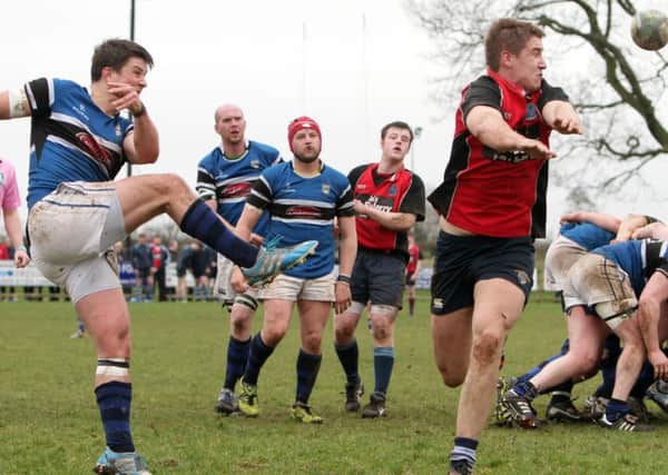BOOTIFUL. Action from Ballymoney's Tweed cup clash with Coleraine on Saturday.INBM14-15 079SC.