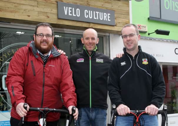 Alan Reynolds and Cormac McWilliams, from Ballymena Rugby Club, who are taking part in a sponsored cycle on Sunday, April 19, raising money for Cancer Research UK, are pictured with Kris Fairfield from Velo Culture, who are helping to sponsor the event and provide support on the day. INBT15-207AC