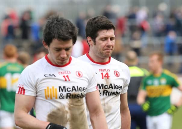 Sean Cavanagh and Mattie Donnelly of Tyrone at the end of the game. ©Press Eye