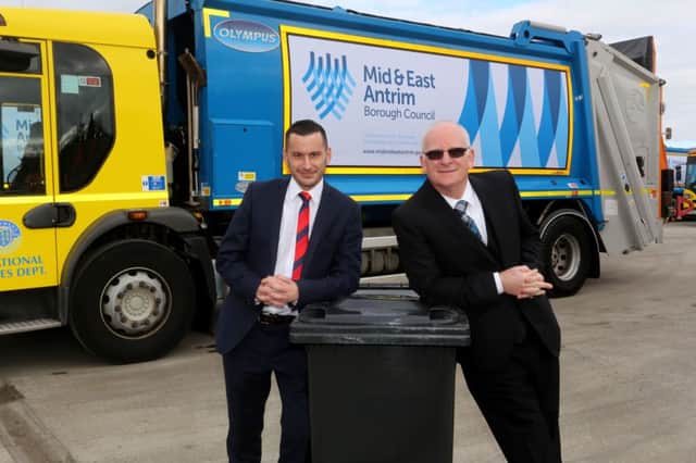Mayor of Mid and East Antrim, Cllr. Billy Ashe, and Deputy Mayor, Cllr. Timothy Gaston, with one of the new re-branded bin lorries. INBT14-243AC