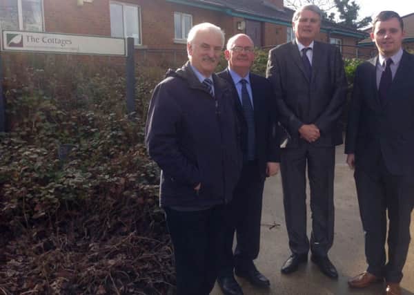Alderman Drew Thompson, Lord Hay, Health Minister Jim Wells and Gary Middleton MLA at the Cottages on Dungiven Road.