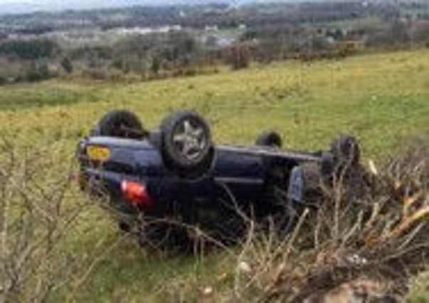 A car overturned on the Rossdowney Road. Picture supplied by local photographer Allen Reavie.