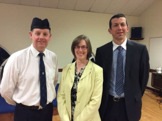 Trevor Stewart, Captain of Tobermore Boys' Brigade with Inspecting Officer Mervyn Tomb and his wife Rachel.  Mervyn works with the Faith Mission and is a former member of Tobermore BB.