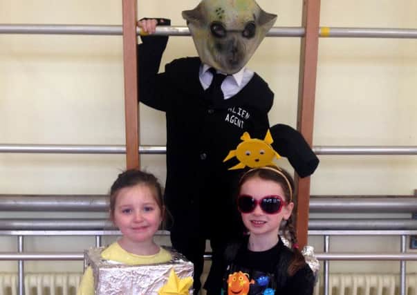 Harry, Abby and Bethany during Model Primary's themed Space Day. INCT 14-003-GR