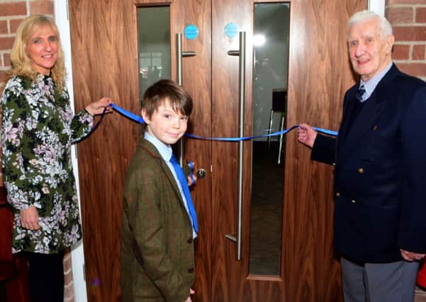 Gillian Davidson, Ethan Gray and Sammy Grant opening the newly refurbished buildings at Abbots Cross Presbyterian Church. INNT 14-055-GR