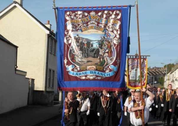 Larne's branch of the Apprentice Boys of Derry, The Walker Club parade their new banner around the town. INLT 14-204-AM