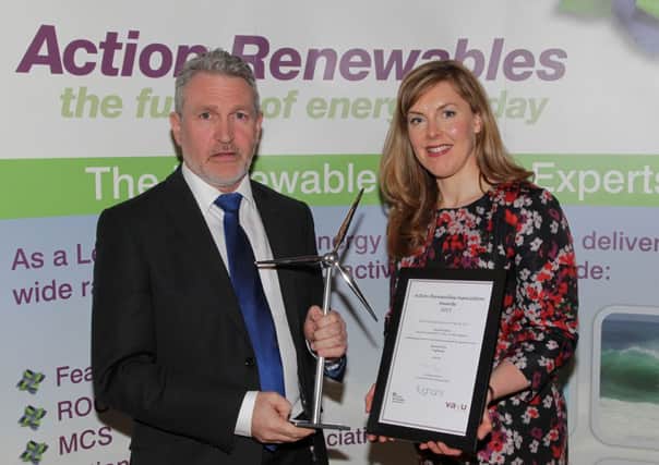 David Surplus receives the Outstanding Award for Work in the Renewable Energy Sector in NI. INLT-14-709-con