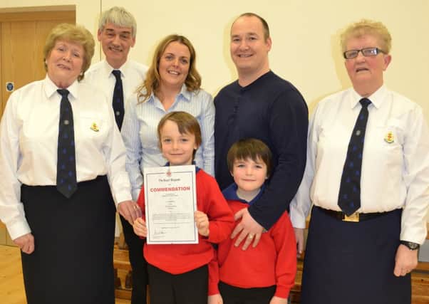 Luca McCafferty and his family with Brian Griffith (12th Newtownabbey BB Captain), Irene Lowry (Vice President of The Boys' Brigade in Northern Ireland) and Joan Gray (Lieutenant in charge of the  Anchor Boys).