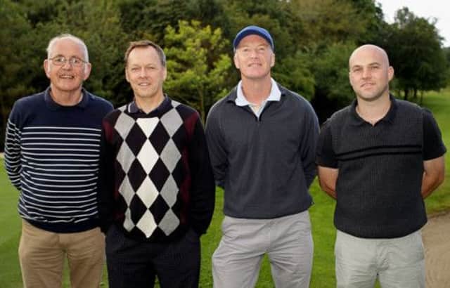 Jim McConkey, Hugh Mulholland, Robert Atkinson and Stephen Hall getting ready for their round at Dunmurry Golf Club. US3112-501cd