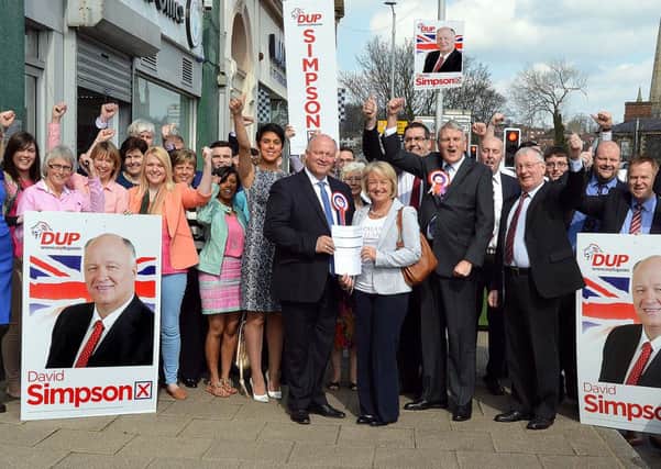DUP candidate for the Upper Bann Constituency, David Simpson, pictured with supporters outside the Electoral Office in Banbridge on Tuesday before handing in nomination papers for the upcoming general election.