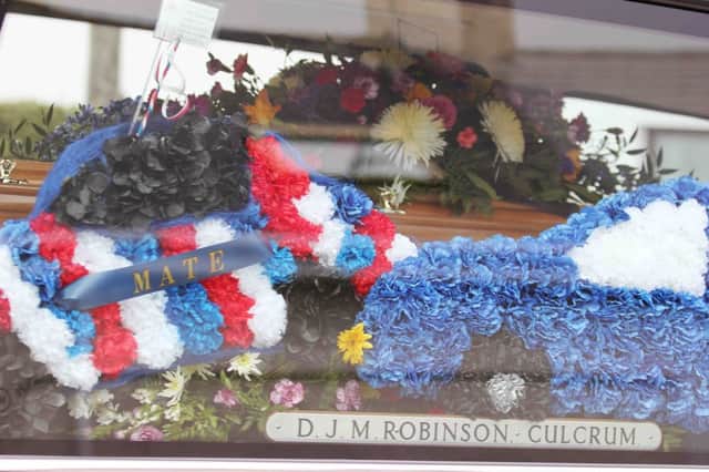Car shaped wreaths from friends of the late Robin Wilson who was killed on Easter Monday.PICTURE MARK JAMIESON.