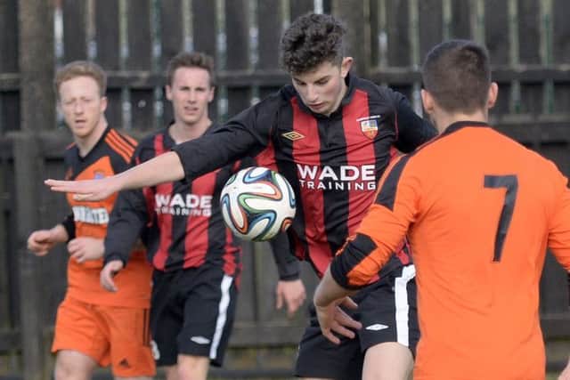 Jordan Hayes and Ryan Gourley in action during Banbridge Town's much-needed win on Saturday afternoon. INBL1515-2EB