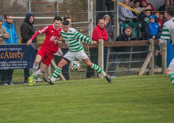 Lurgan Celtic hold off a challenge by Annagh United.