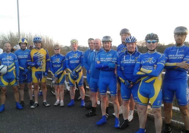 All smiles after the opening time trial are members of the West Down Wheelers. From left to right: Darren Lindsay, Andrew Hodgen, Mark Alexander, Dorothy Cantley, John Kernaghan, David Frizell, Jonathan Maxwell, Alistair McCourt, John Clyde, Karl Wells, Matthew McKinistry and Paul Wilkinson.