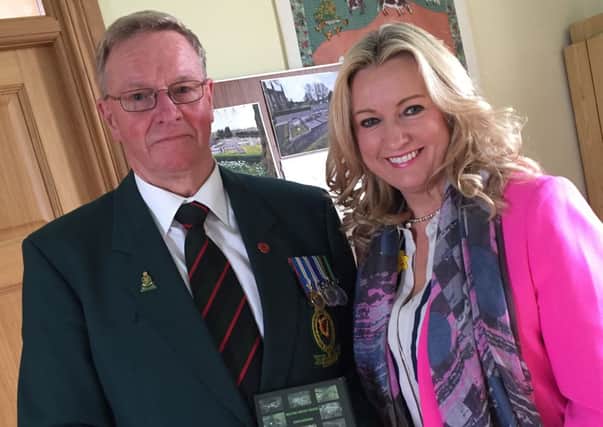 Jo-Anne Dobson MLA with fund raising Committee Chairman Ronnie Quigg supporting the memorial wall fund