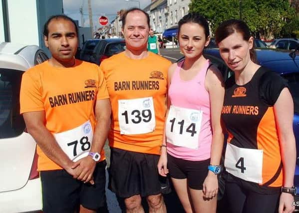 Members of Barn Runners at the Whitehead 5-mile road race. INLT 16-912-CON