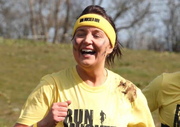 All smiles from this competitor at Run Mucker Run for Action Cancer in Ballymoney. PIC: Mark Jamieson