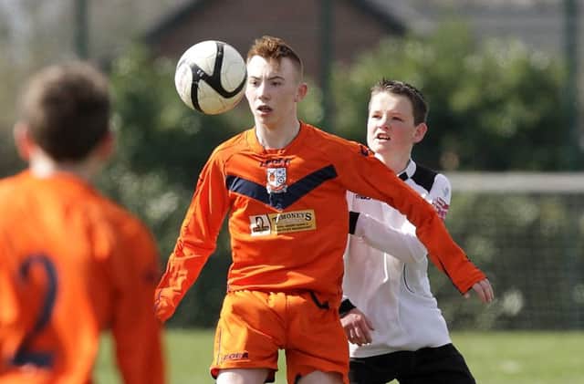 Action from the under-14 game between Lisburn Distillery and Windmill, at Barbour. US1515-508cd  Picture: Cliff Donaldson