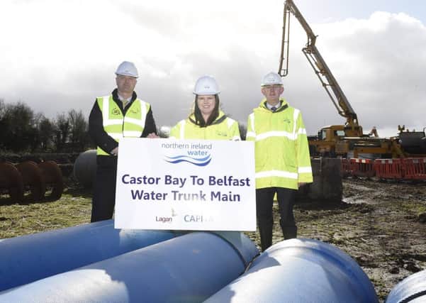 (L-R) Seamus Devlin-Ireland Regional Director Lagan Construction Group, Sara Venning NI Water Chief Executive and Paul Davison of NI Water pictured on site near Moira to mark the laying of the 5000th pipe on NI Waters £14m Castor Bay to Belfast Water Pipeline